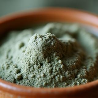 Clay face mask texture close-up in a bowl